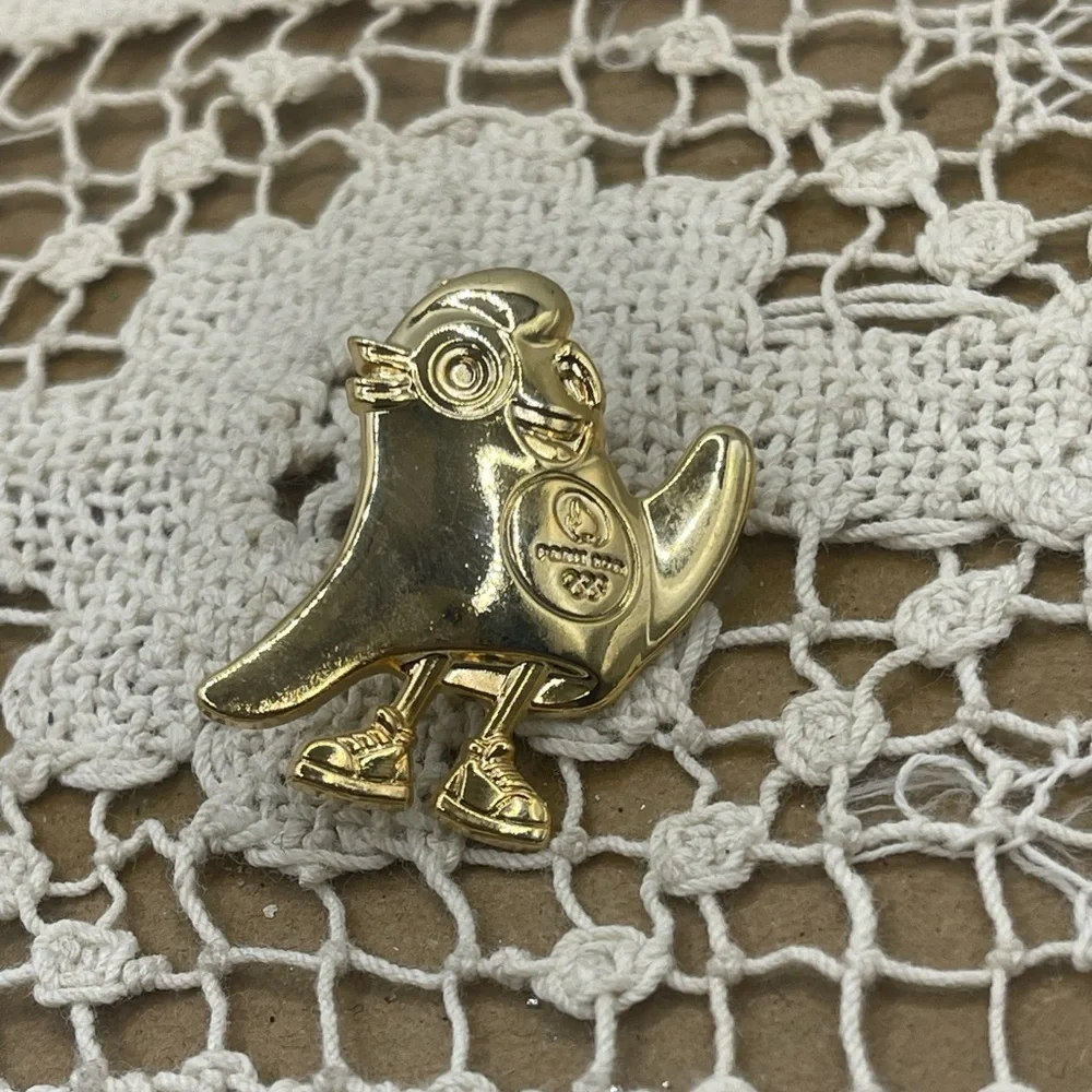 Gold Olympic Bird Pin